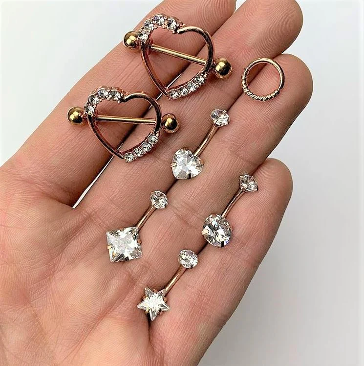 14G 3/4 Clear Gem Gold Anodized Heart Nipple Shield Set - Image 2
