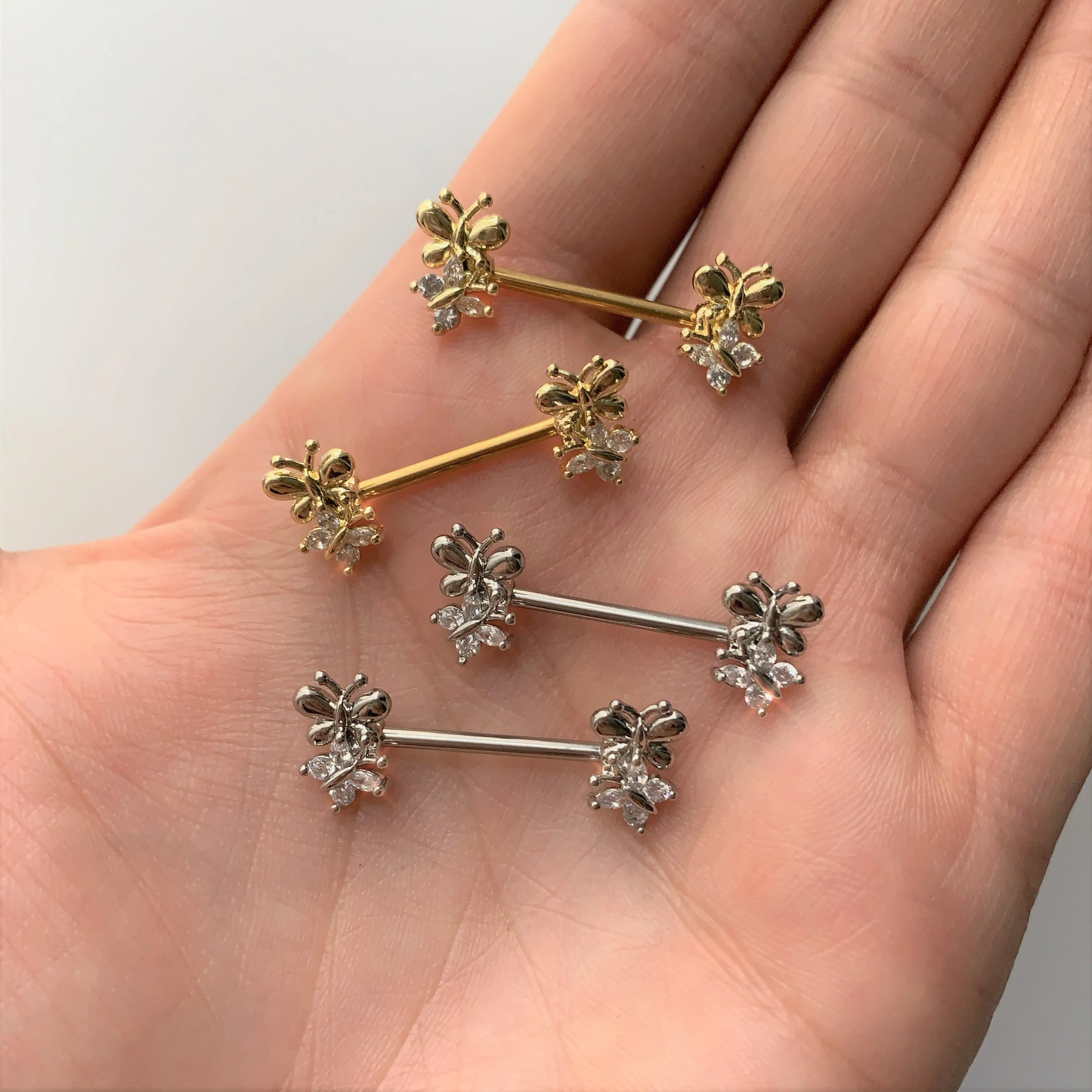 14G 5/8 Clear CZ Gem Gold Tone Butterfly Barbell Nipple Set - Image 2