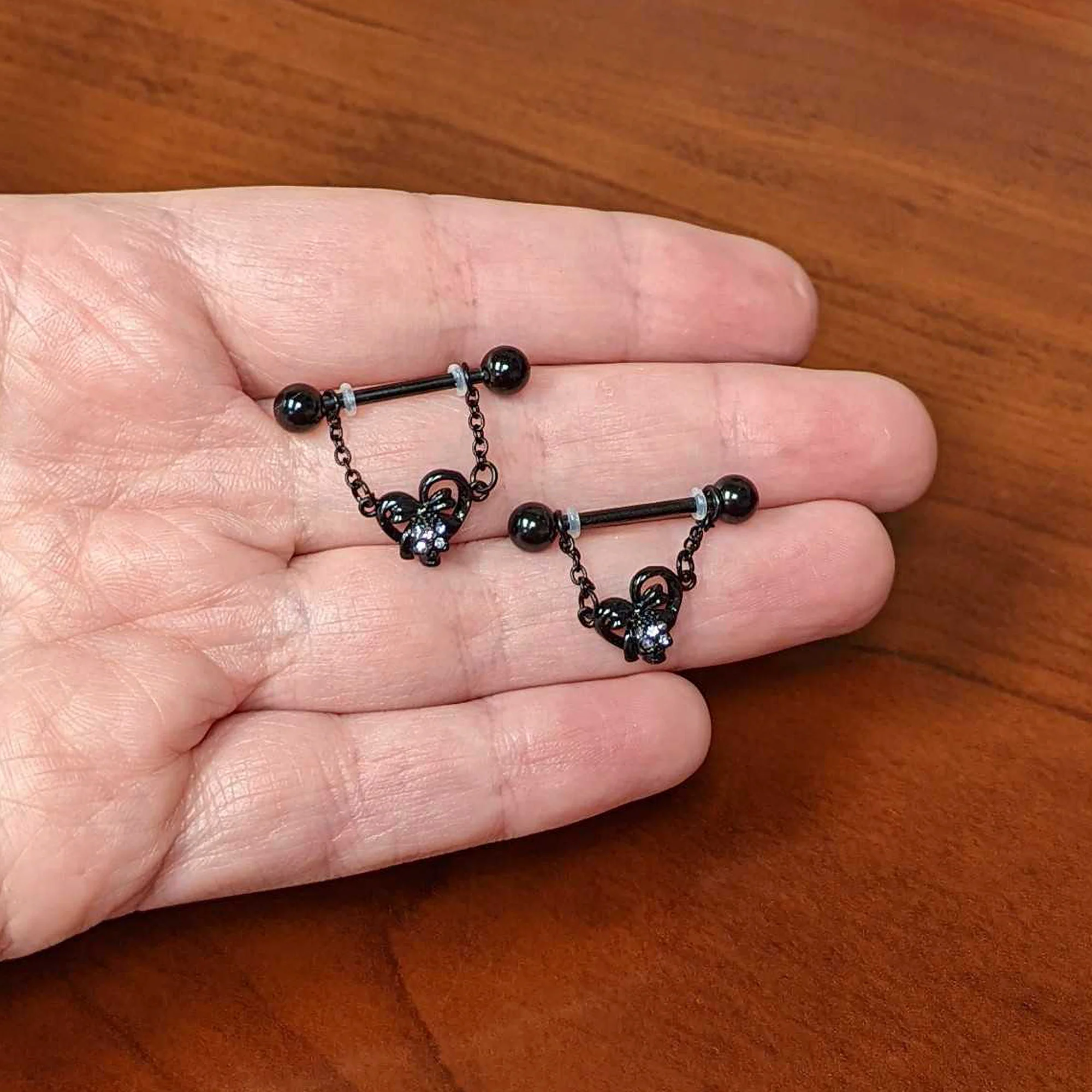 14G 9/16 Clear Gem Black Skull Bow Heart Dangle Nipple Ring Set - Image 4