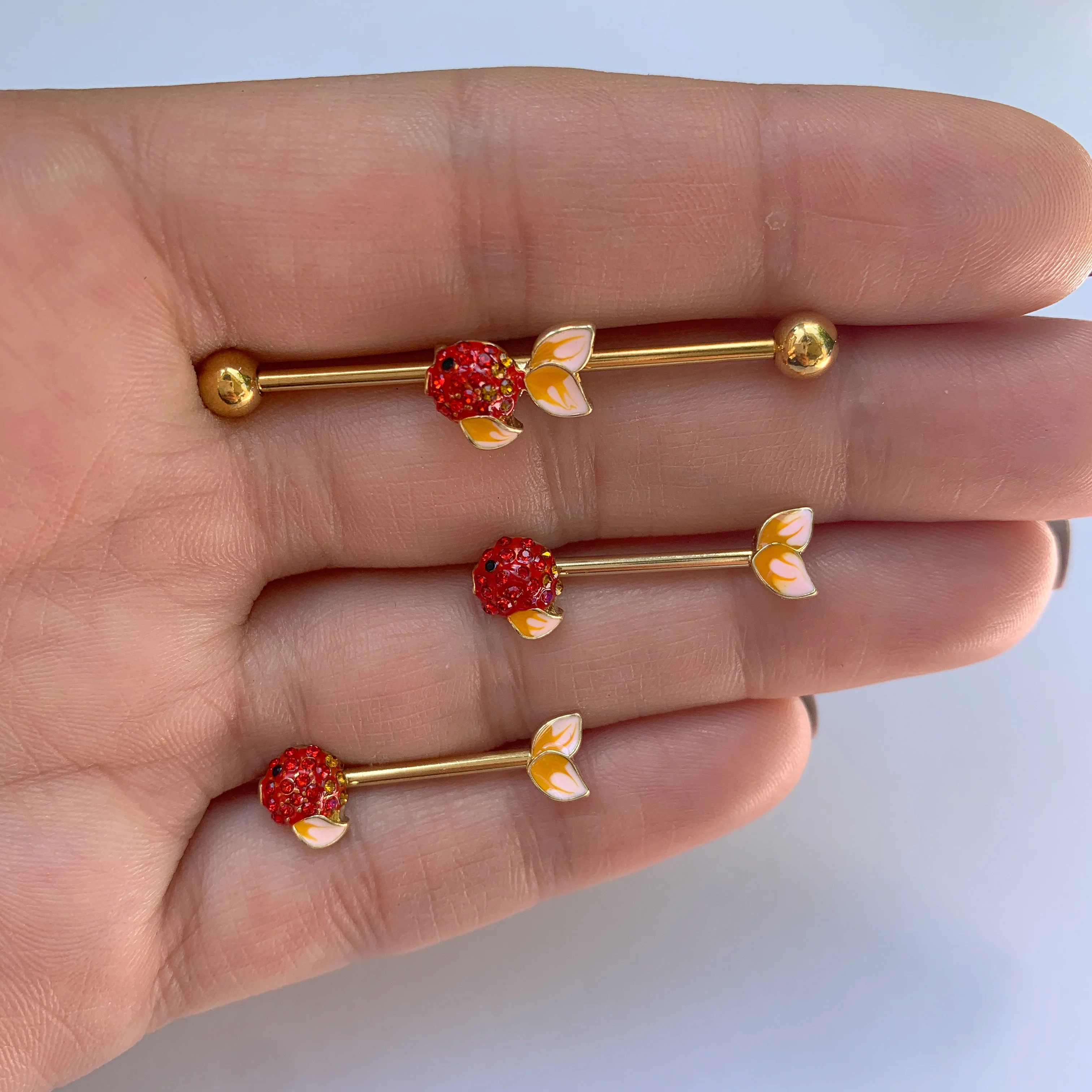 14G 9/16 Red Gem Gold Tone Blowfish Barbell Nipple Ring Set - Image 2