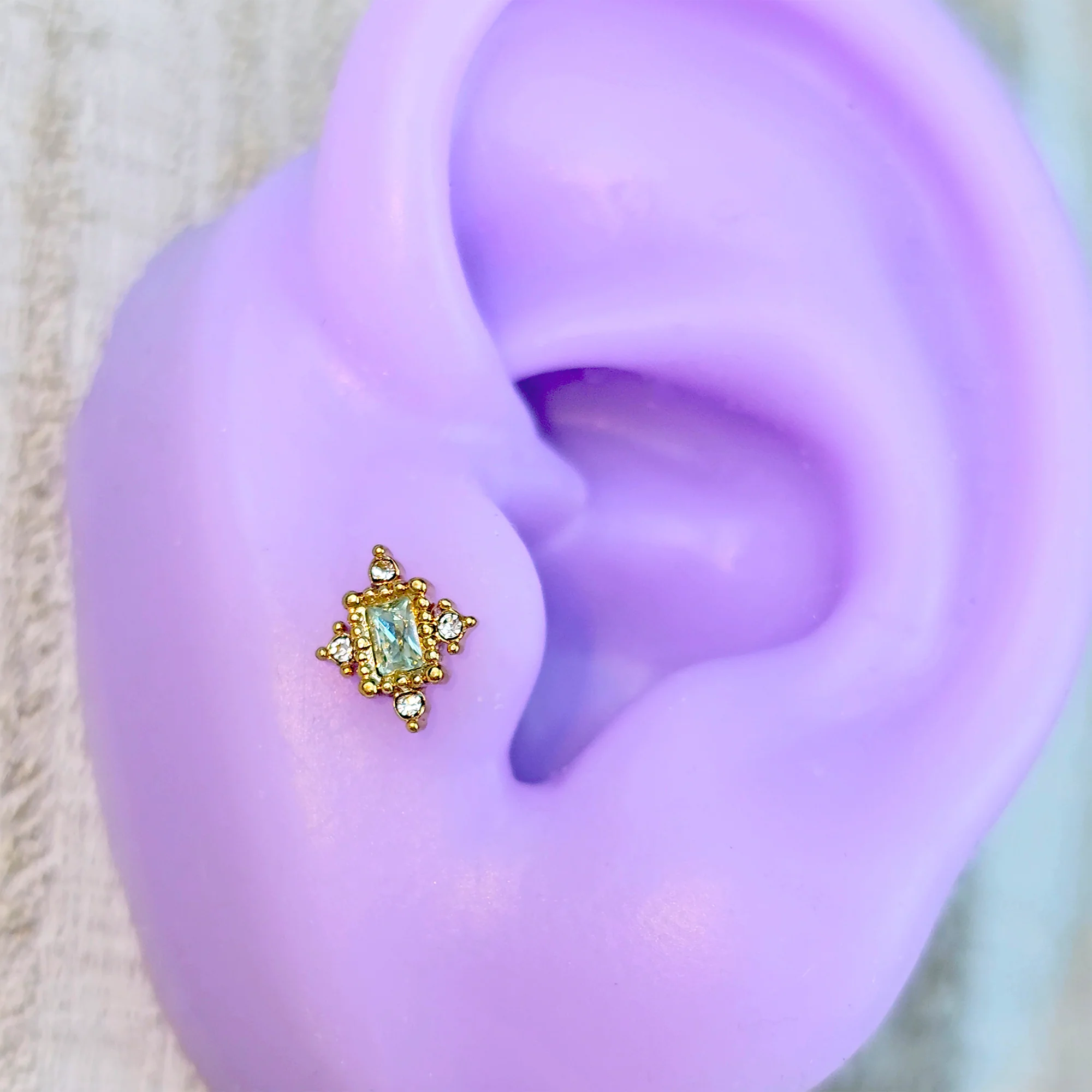 16G 1/4 Clear Blue Gem Gold Tone Regal Seal Cartilage Tragus Earring