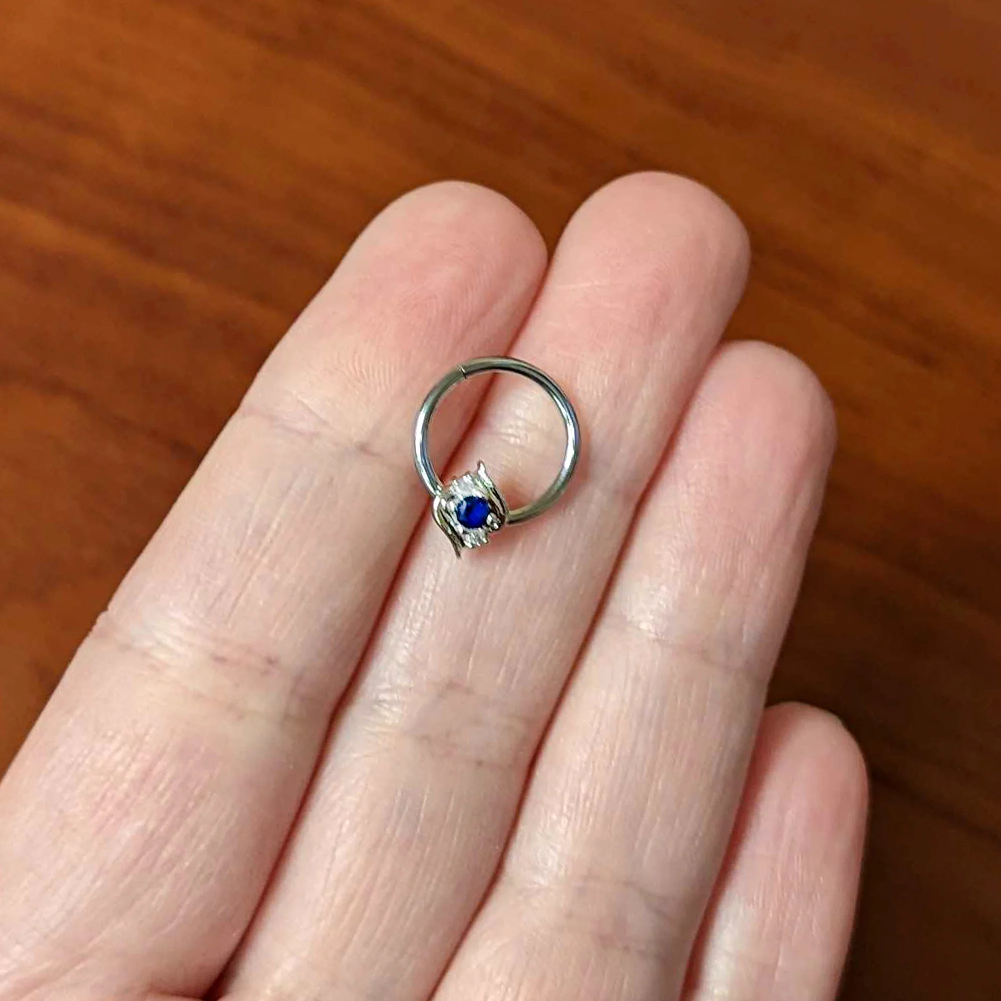 16G 3/8 Clear Blue Gem Oval Swirl Hinged Segment Ring - Image 4