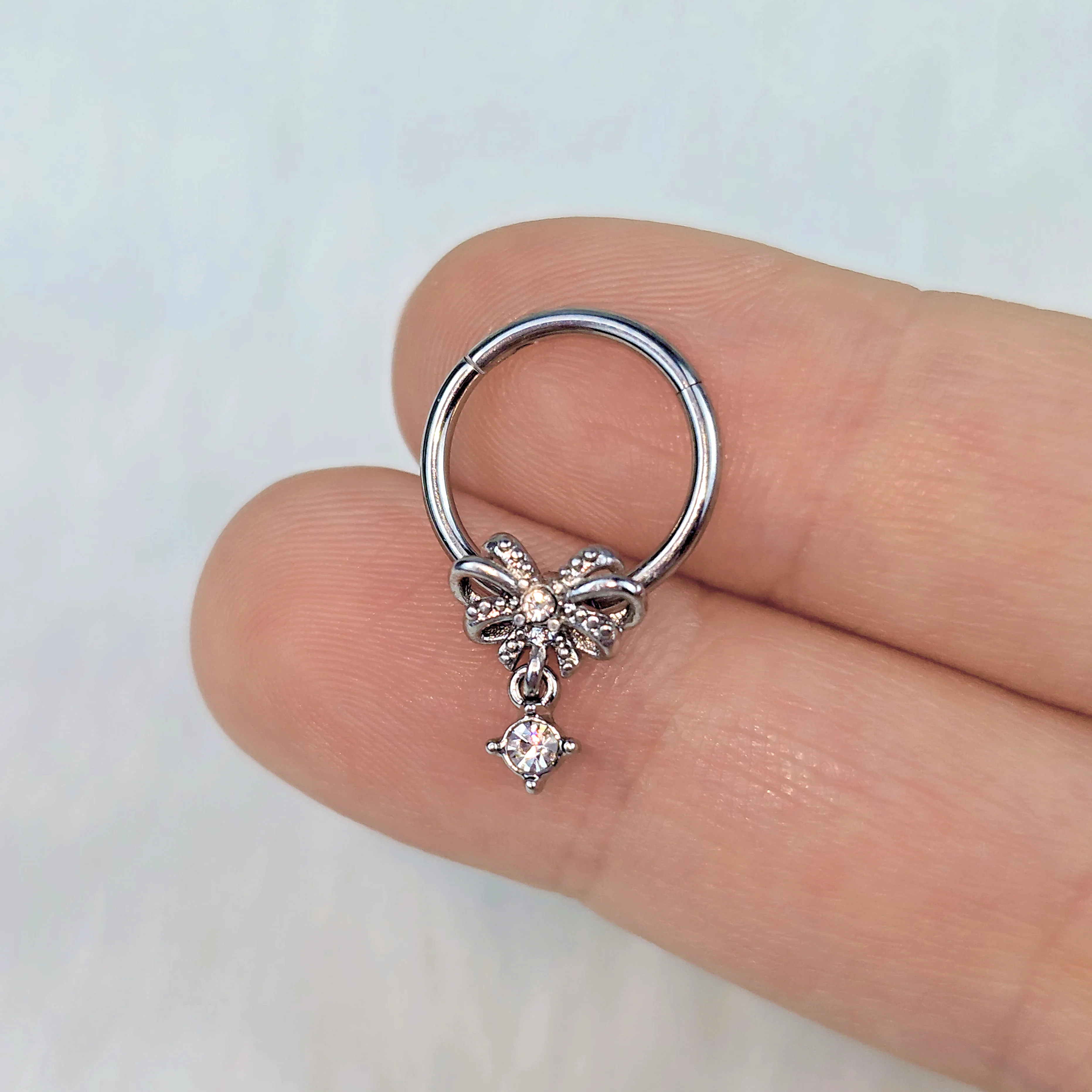 16G 3/8 Clear Gem Looping Bow Hinged Segment Ring - Image 4