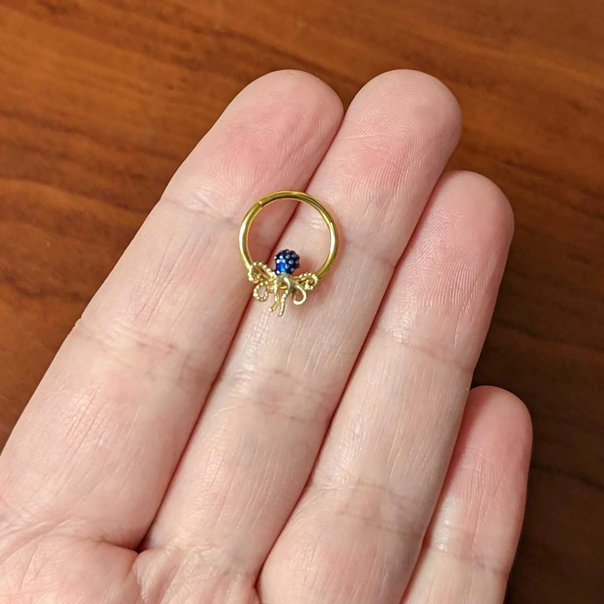 16G 3/8 Gold Tone Textured Blue Octopus Hinged Segment Ring - Image 4