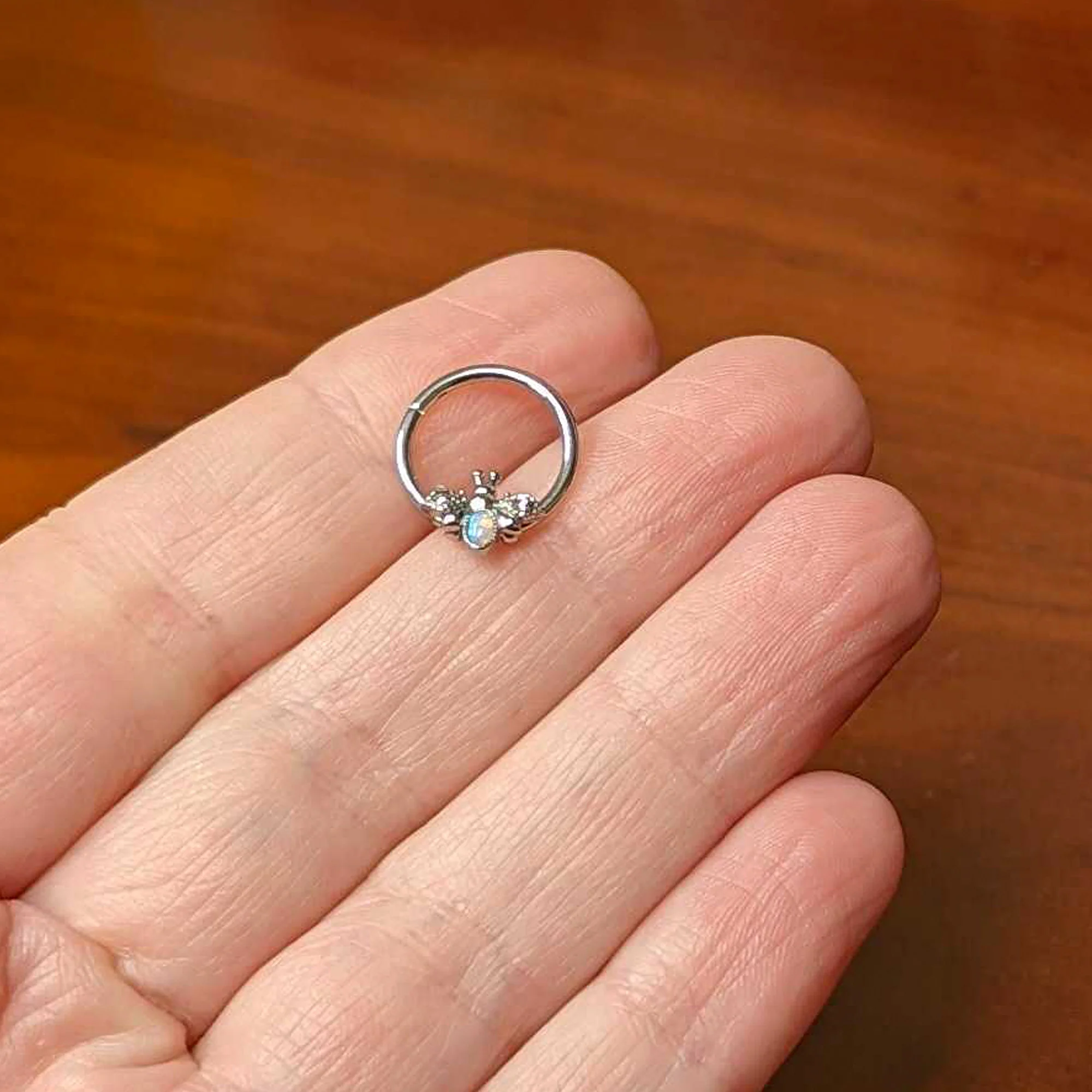 16G 3/8 White Synthetic Opal Insect Hinged Segment Ring - Image 4