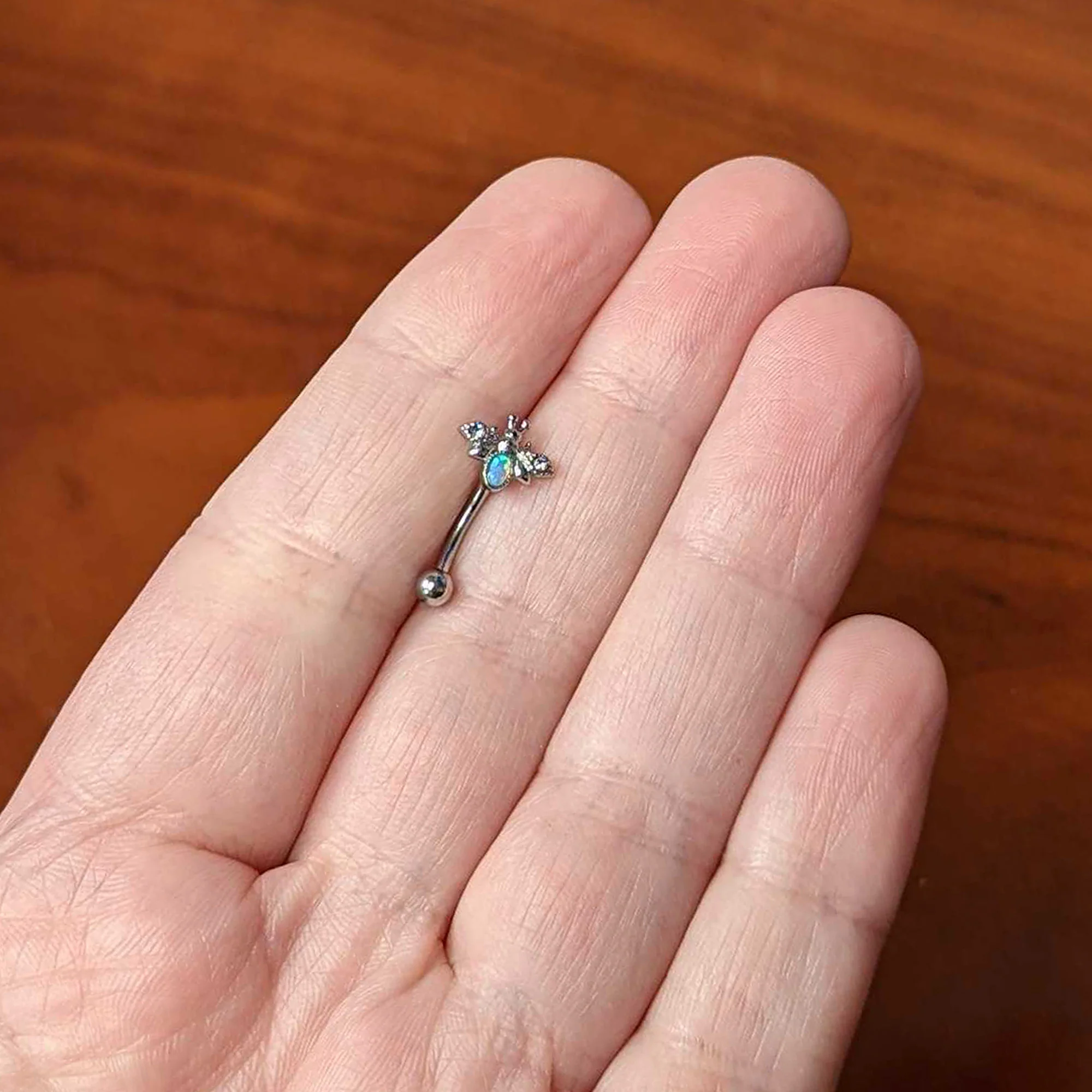 16G 5/16 White Synthetic Opal Insect Curved Eyebrow Ring - Image 3