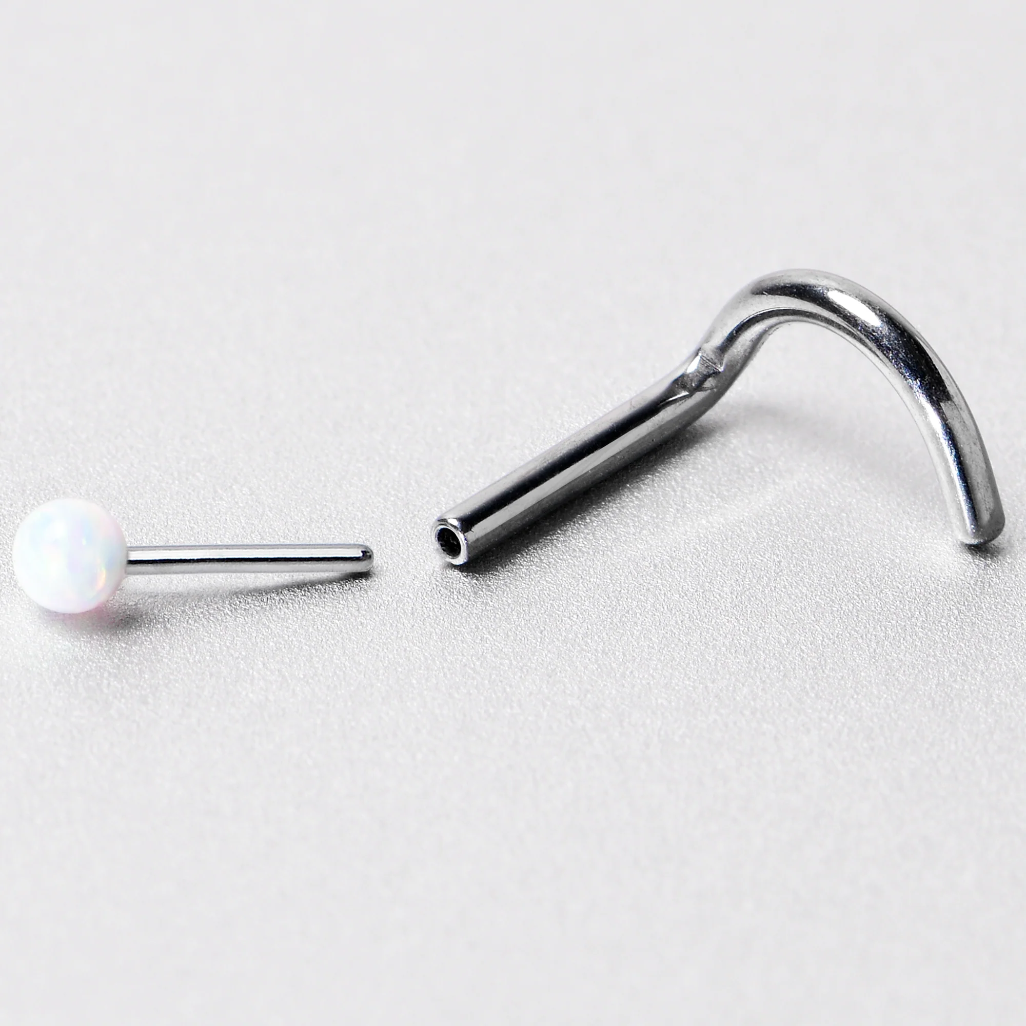 18G 1/4 White Synth Opal G23 Titanium Threadless Left Nose Screw - Image 8