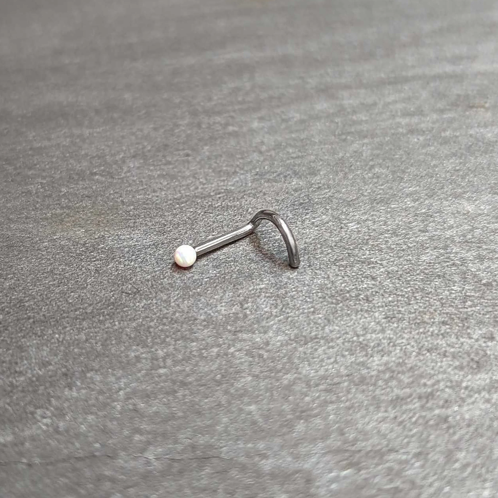 18G 1/4 White Synth Opal G23 Titanium Threadless Left Nose Screw - Image 9