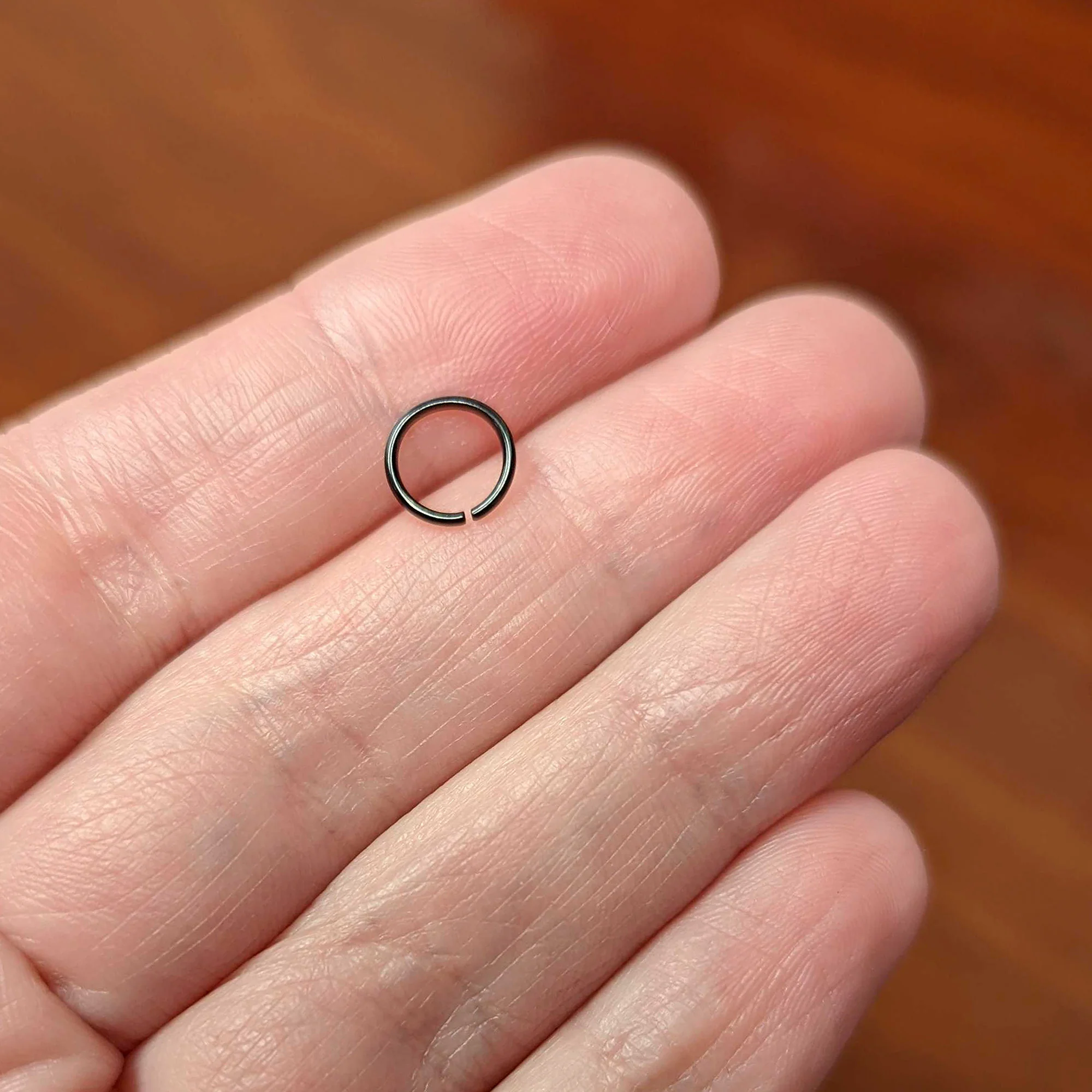 20G 1/4 Black PVD Grade 23 Titanium Bendable Hoop Ring - Image 4