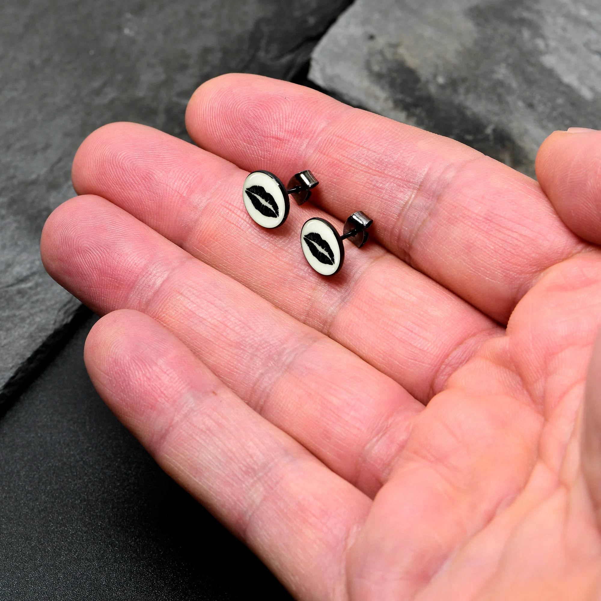 Black Anodized Steel Lipstick Kiss Mark Glow in the Dark Stud Earrings by Onyx O - Image 3