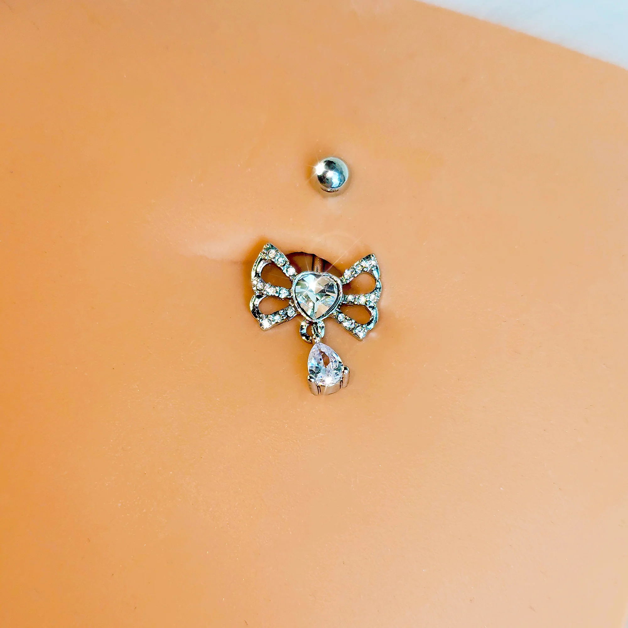 Clear CZ Gem Heart In A Bow Dangle Belly Ring - Image 2