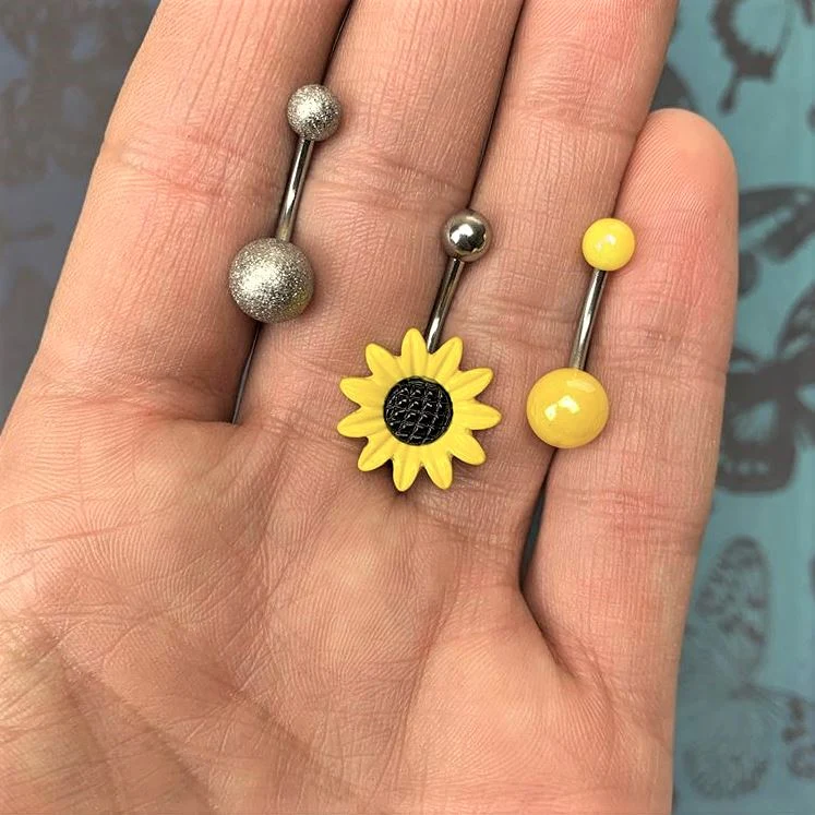 Sandblasted and Yellow UV Glow Sunflower Belly Ring Set of 3 - Image 2